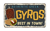 Gyros vintage rusty metal sign on a white background, vector illustration
