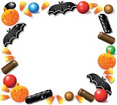 Orange pumpkins and black licorice bites, with black bats and candy corn make a frame for your text. 