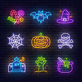 Halloween neon icons. Happy Halloween isolated icons, emblem, design template.  Candy, Bat, Witch hat, Web, Pumpkin, Skull, Grave, Zombie hand, Witches bowler. Vector Illustration