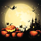 - haunted castle with halloween pumpkins