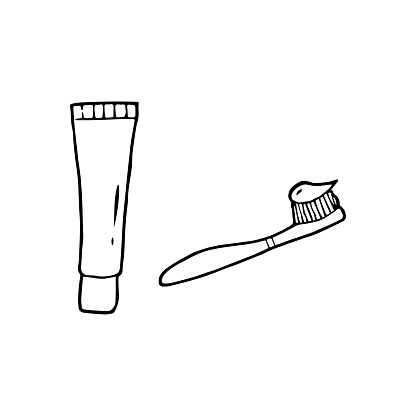 Hand drawn doodle toothbrush and toothpaste. Vector elements.