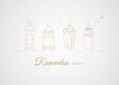 Hand Drawn Illusration of Golden Ramadan Lanterns with Lights on White Background. Vector Illustration