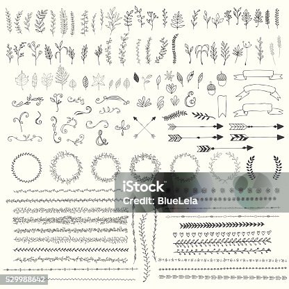istock Hand drawn vintage leaves, arrows, feathers, wreaths 529988642