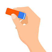Hand holding a blue and red pencil eraser vector isolated. Office supplies and school equipment. Stationery tool.