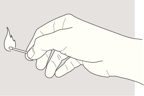 hand holding a match