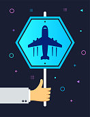 Hand holding flight tickets‎ vintage rough street or banner sign on colorful background. Can be used for web banners and infographic design.