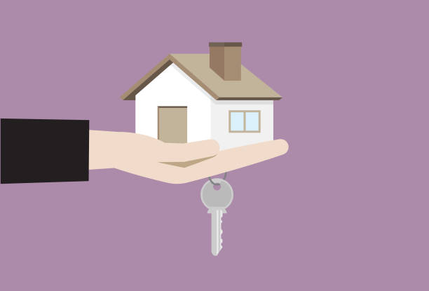 Hand holding house and house key vector art illustration