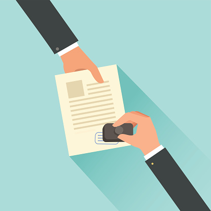 Hand Stamping Notary Approving A Documents Stock Hand Stamping Notary Approving A Documents Stock