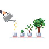 istock Hand with watering can pouring golden coins money 831625774