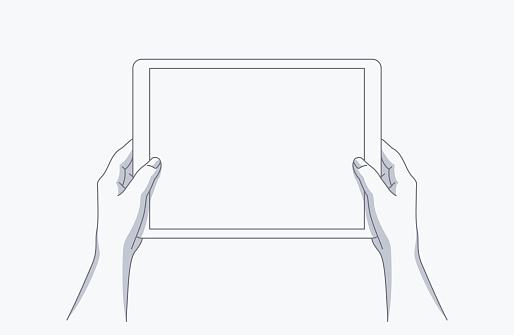 Hands holding a tablet