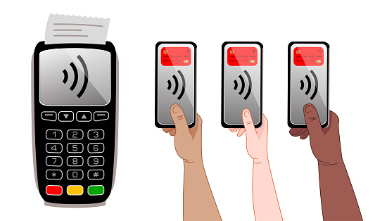 Hands with a smartphone pay contactlessly