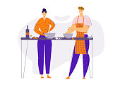 Happy Couple Preparing Food Together in the Kitchen. Man and Woman Characters Cooking at Home. Family Relationships. Vector flat cartoon illustration