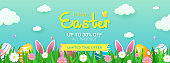 Happy Easter Sale Banner Vector illustration. Rabbit ears and Easter eggs in spring meadow