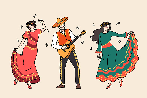 Happy Mexican people in traditional clothes dancing