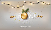 Happy new year 2020 on a white background with Christmas light and decoration.