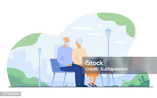istock Happy senior couple sitting on bench in park 1271507044