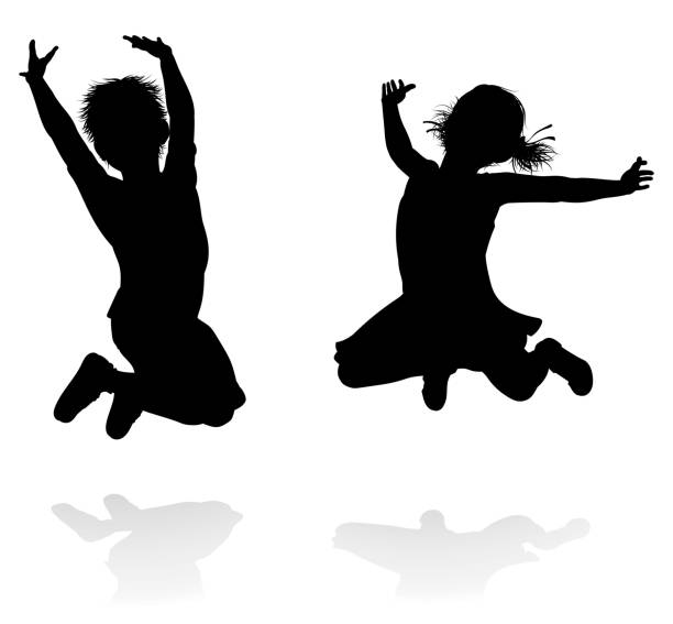 Happy Silhouette Kids Jumping Happy boy and girl silhouette kids or children jumping clip art of kid jumping on trampoline stock illustrations