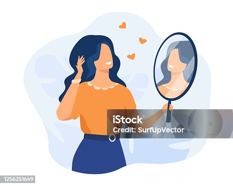 istock Happy woman looking at herself in mirror 1256251649