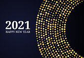 2021 Happy New Year of gold glitter pattern in circle form. Abstract gold glowing halftone dotted background for Christmas holiday greeting card on dark background. Vector illustration