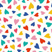 istock Heart pattern background. Cute vector seamless repeat pattern of small textured hand drawn colourful all over hearts. 1331318441