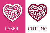 Heart shape with cutout paper swirls, template for laser cutting or wood carving, elegant decoration for valentine's day