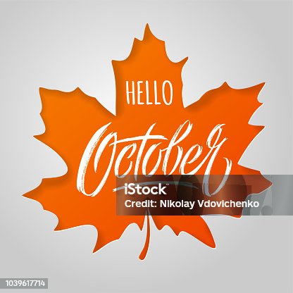 istock Hello October lettering with maple leaf on light background. Paper cut style. Modern brush calligraphy. Autumn banner. Vector typography for social media banner, greeting card, poster, flyer. 1039617714