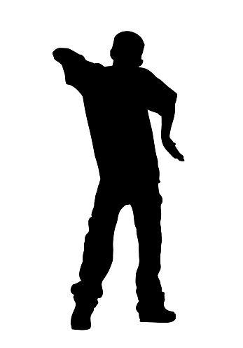 Hip hop dancer shows skill silhouette