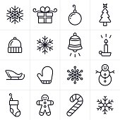 Christmas and holiday icon and symbol collection. Sixteen icons and symbols including a set of four unique snowflakes, a gift, an ornament, a christmas tree and winter hat. Also includes a winter mitten, snowman, candle, santa's sleigh, a christmas stocking, candy cane, and gingerbread man.