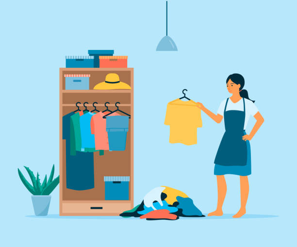 ilustrações de stock, clip art, desenhos animados e ícones de home organization concept. flat vector illustration of woman cleaning her wardrobe. - clothes wardrobe