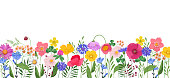 istock Horizontal banner with multicolored wildflowers and leaves 1339977304
