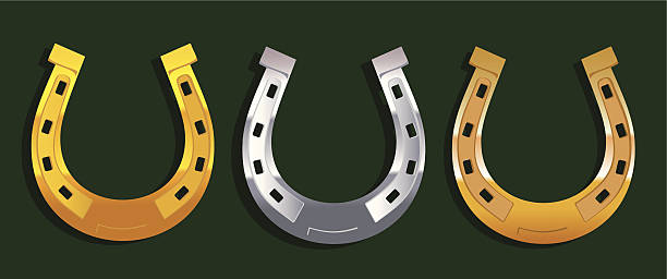 Horseshoe Three horseshoes gold, silver, bronze on a green background horseshoe stock illustrations