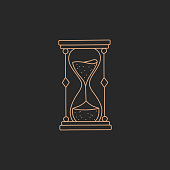 istock Hourglass or sandglass logo, gold simple contour line 1313259950