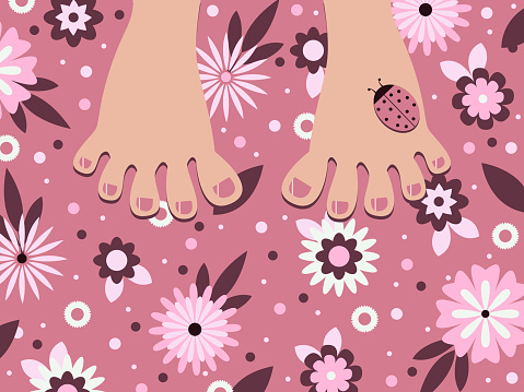 human feet and a ladybug  on pink grass with decorative flowers