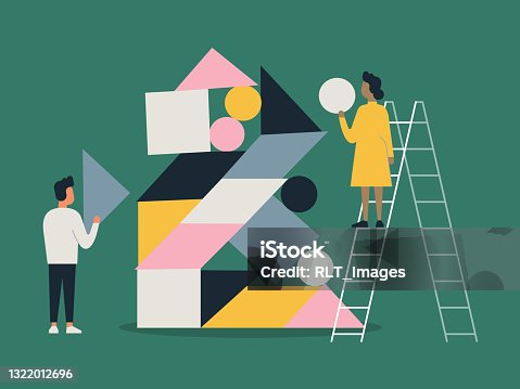 istock Illustration of people building with balanced shape blocks 1322012696