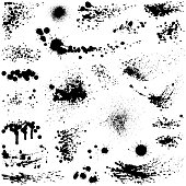 Set of ink splashes. Hand drawn paint design elements. Isolated vector grunge image black on white.