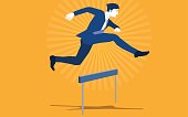 istock Jumping over hurdle 646385120
