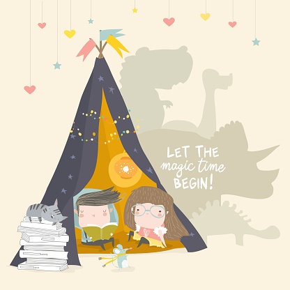Kids reading book in a teepee tent