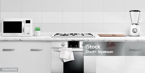 istock Kitchen counter top with microwave oven, gas stove 1326550950