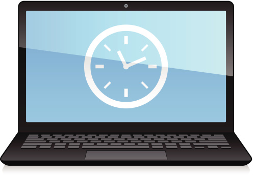 Laptop Displaying Clock