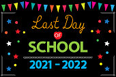 istock Last Day of School 2021-2022 banner on black school board. End of school year concept. 1396725630