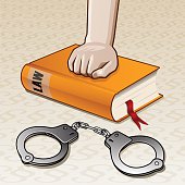 istock Law, Statute book, and handcuffs 524153711