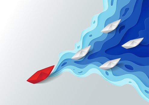 Leadership concept, Origami red paper boat floating in front of white paper boats on blue water polygonal trendy craft style, Paper art design background