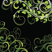 Swirling ornate leaf motif design on a black background.