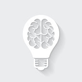 istock Light bulb with brain. Icon with long shadow on blank background - Flat Design 1371695834