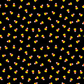 Vector seamless patten of little candy corn candies on a black background.
