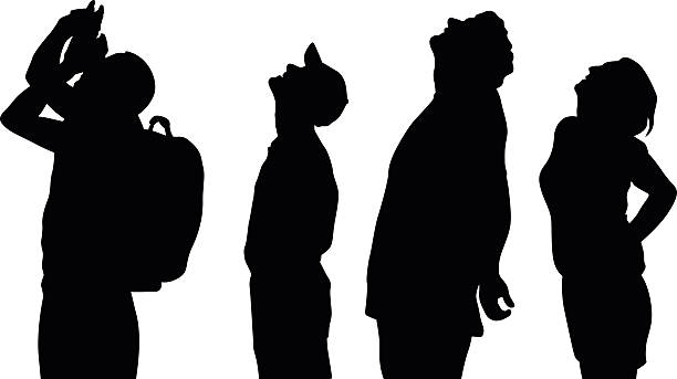 Looking Up A vector silhouette illustration of four people with their heads turned upwards looking towards the sky. looking up stock illustrations