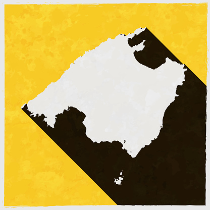 Majorca map with long shadow on textured yellow background