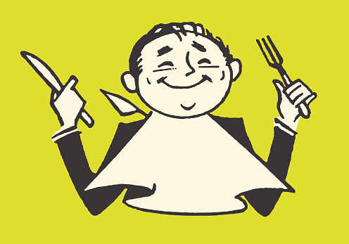 Male Smiling Holding Knife and Fork