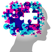 A male side silhouette overlaid with various semi-transparent “Jigsaw Puzzle Piece” shapes. Overlaid across the centre is a white jigsaw piece.