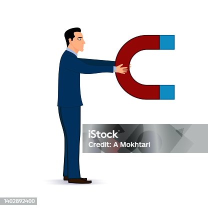 istock Man catches with magnet 1402892400